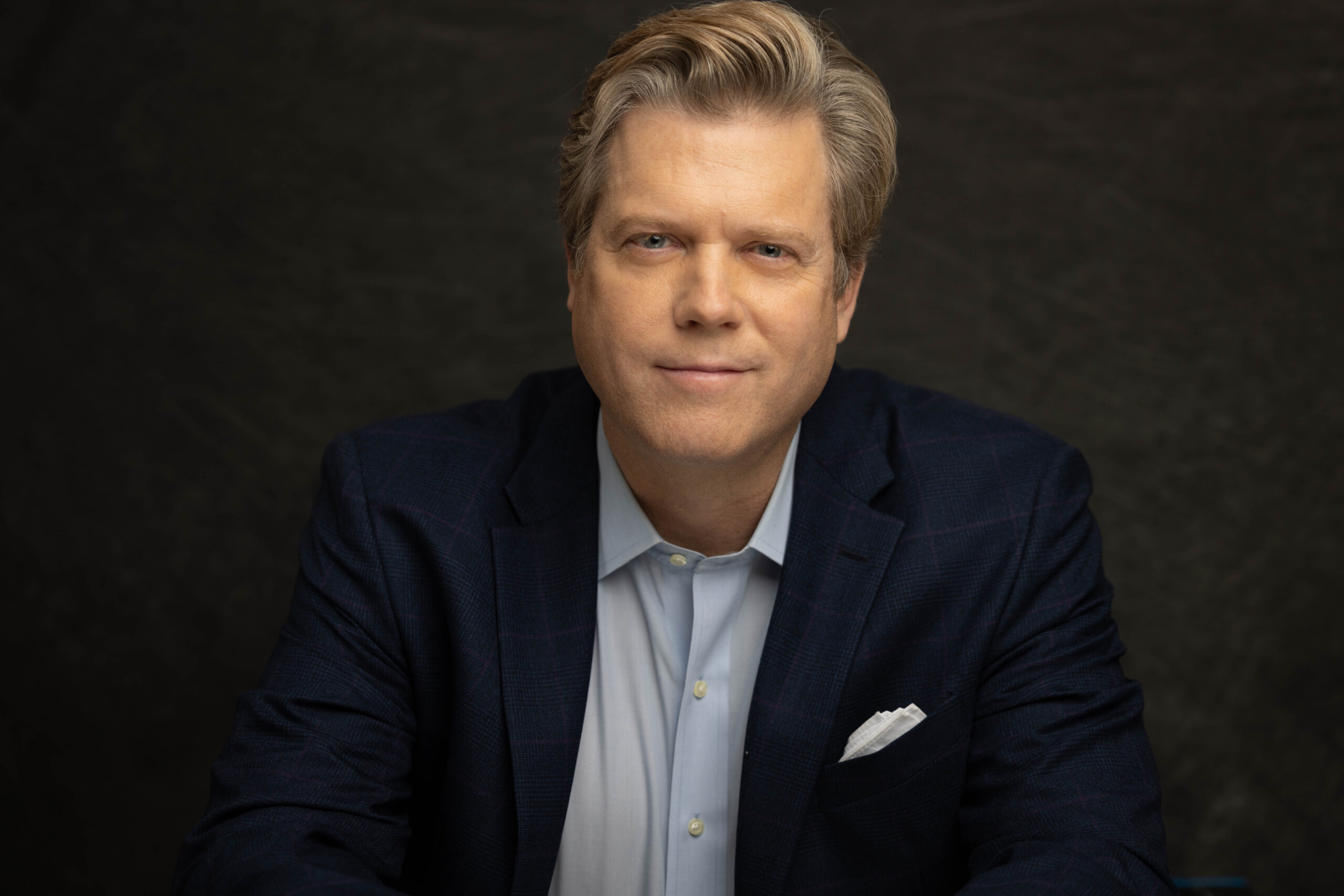 108033437 1726162156340 Carter Braxton Worth Headshot scaled